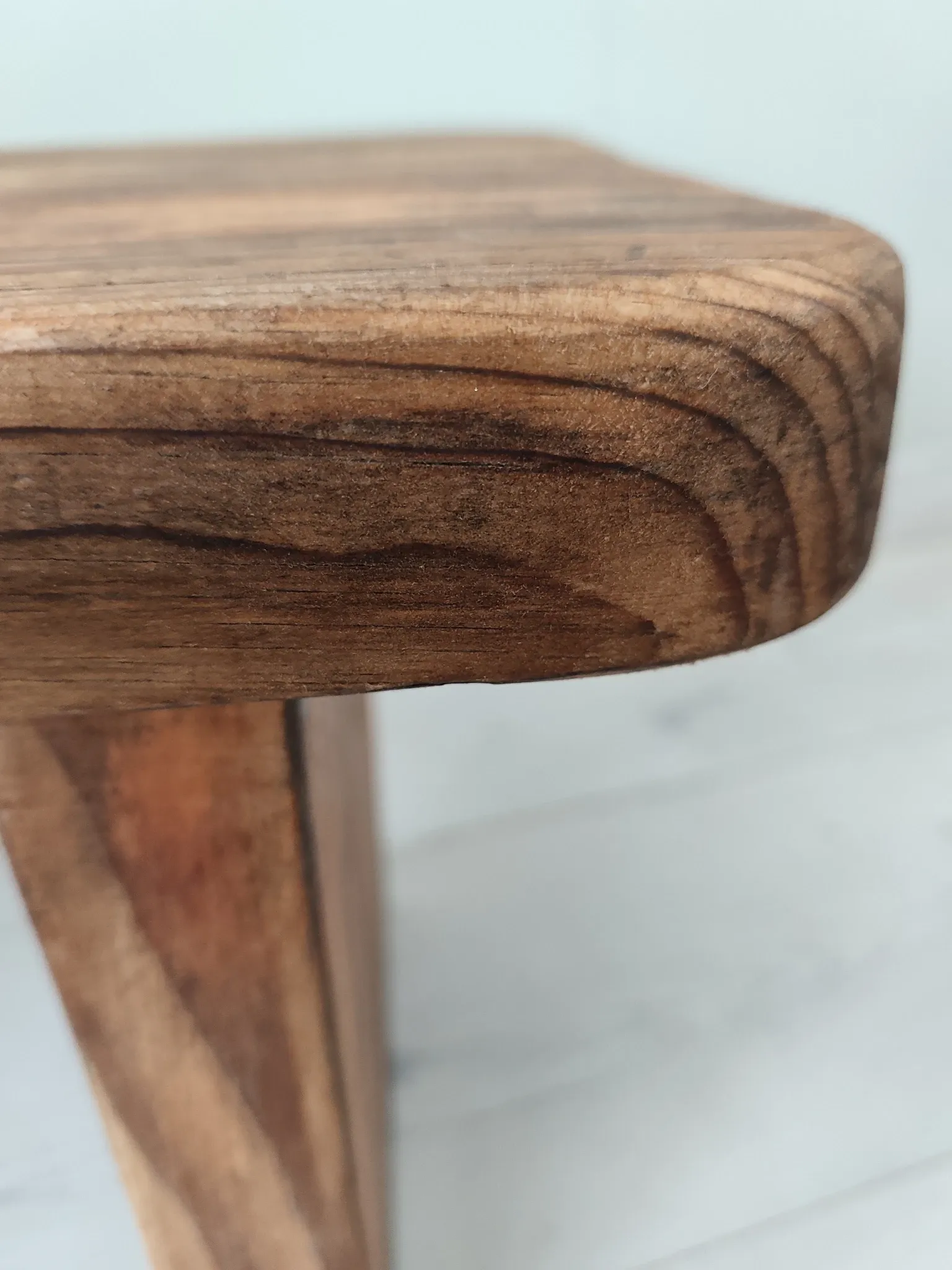 Small rustic wooden bench