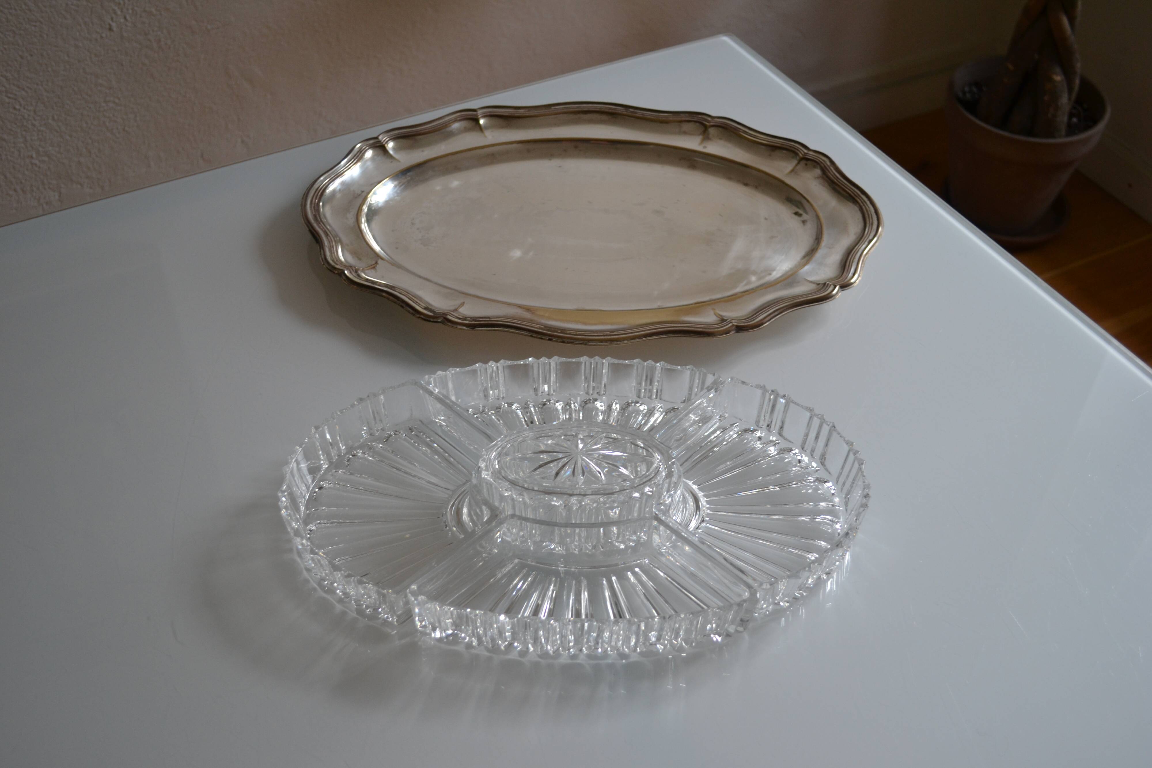 Silver-plated metal aperitif serving tray with HKE hallmark and glass.