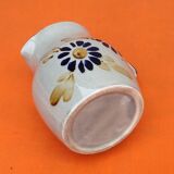 Glazed ceramic pitcher floral decoration