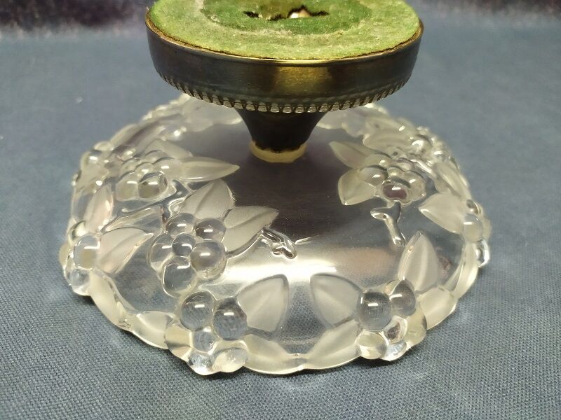 Fruit cut in glass foot silver metal