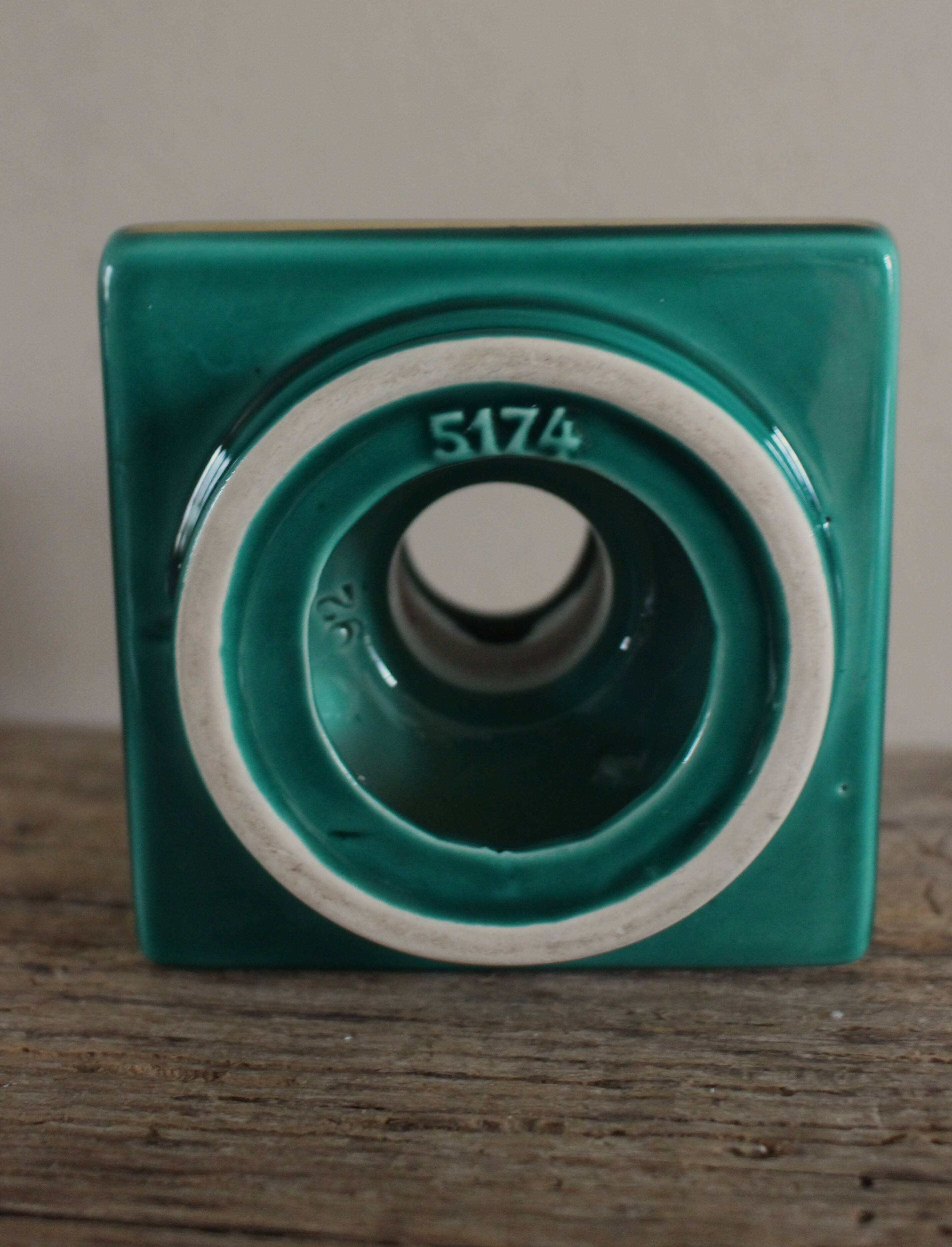 Cave rat candlestick, green earthenware with gilding from the 1950s.