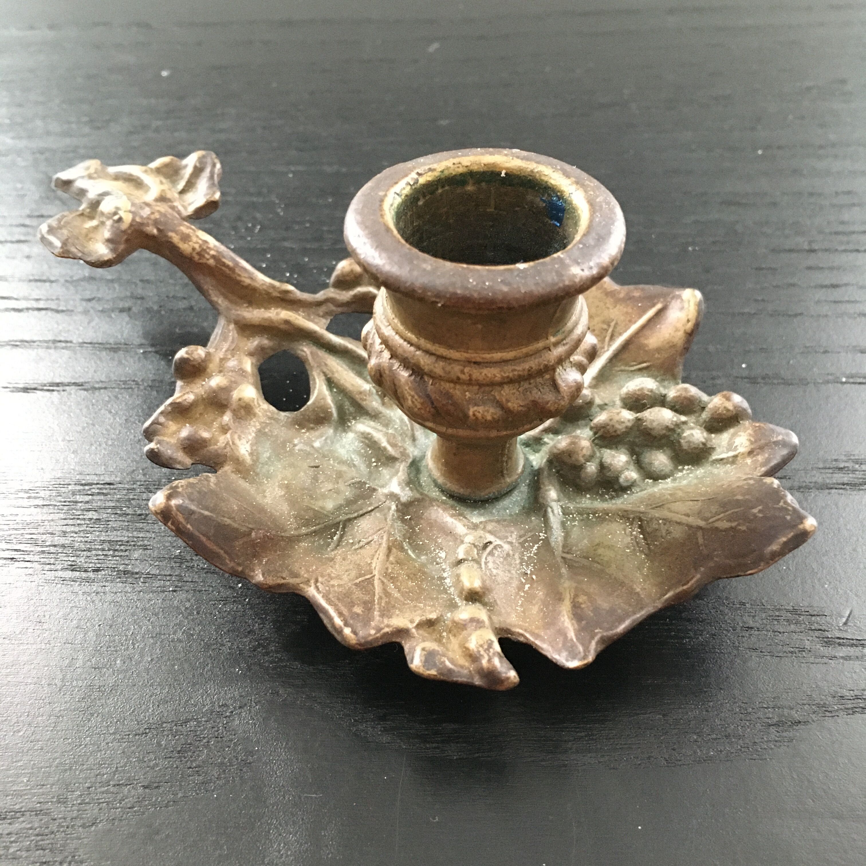 Bronze cellar rave candle holder