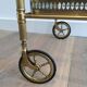 Neoclassical brass trolley with removable trays.