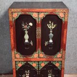 Asia, 20th century: Lacquered cabinet decorated with vases of flowers in hardstone