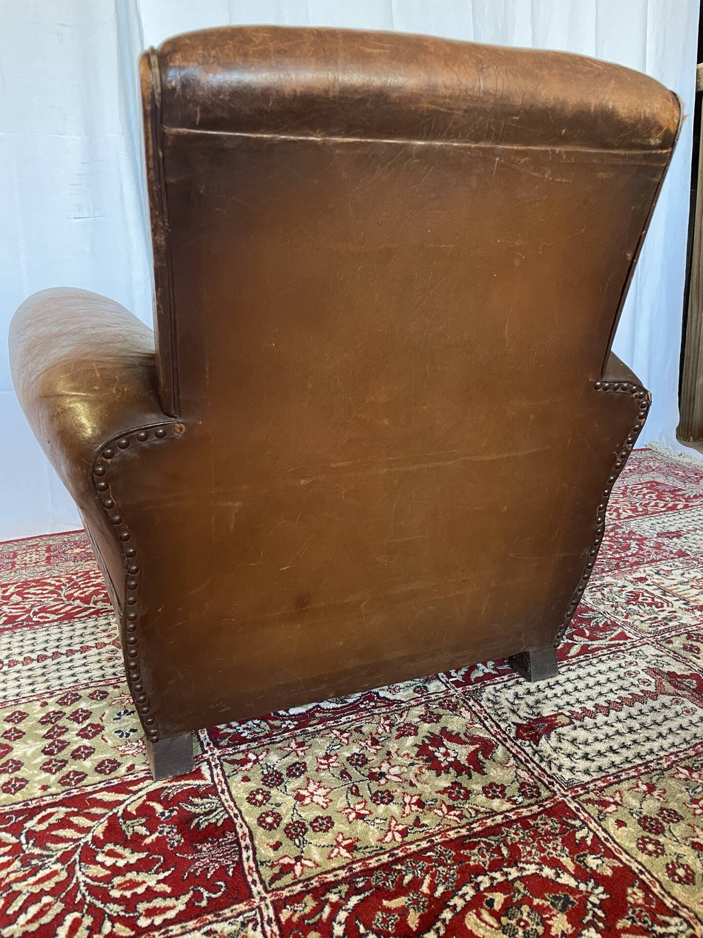 Vintage club armchair in cowhide leather