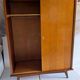Armoire vintage à pieds compas