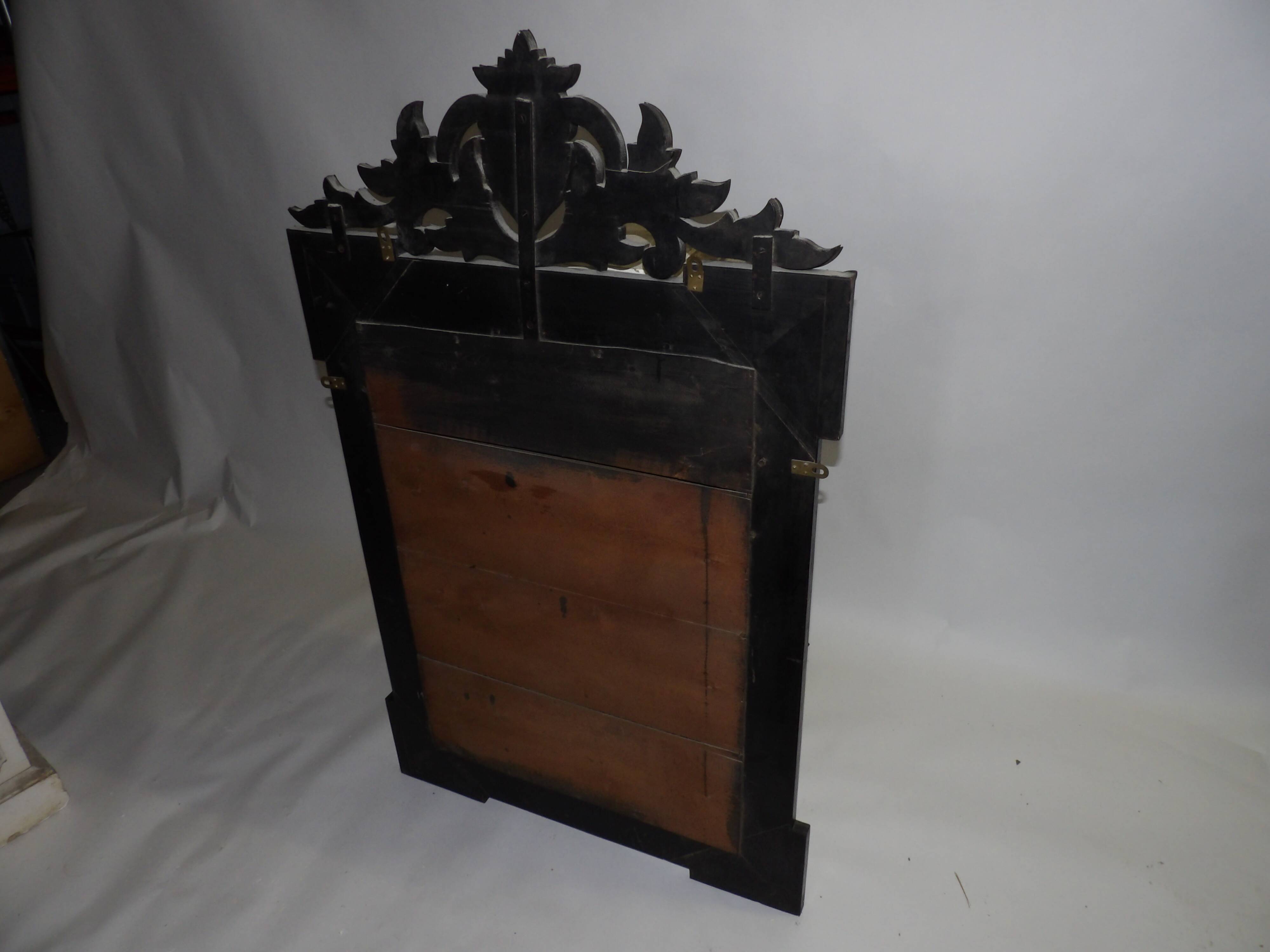 Richly decorated Venetian mirror