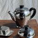Tea set including teapot, milk jug, sugar bowl and butter dish