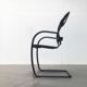 Set of vintage Italian postmodern cantilever armchairs Canasta by Heron Parigi for Heron Parigi Design.