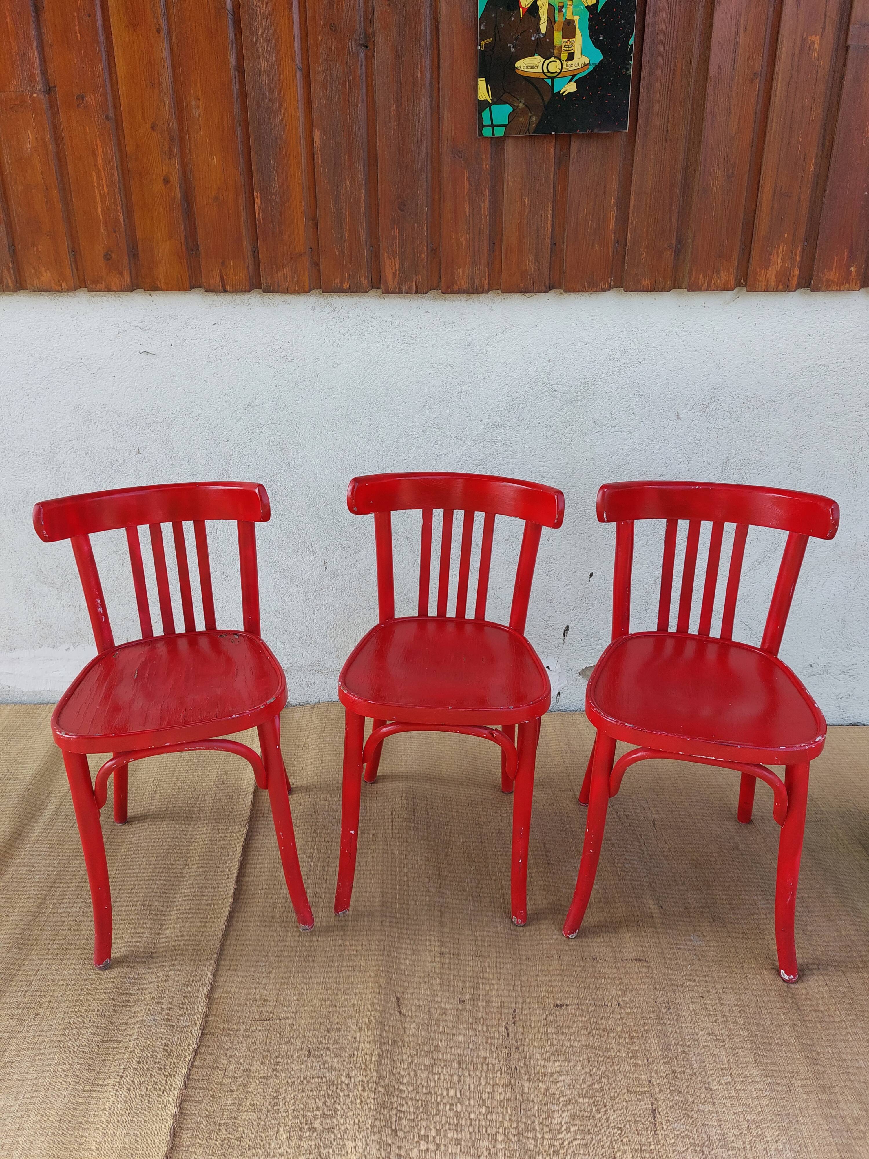 Red baumann chairs
