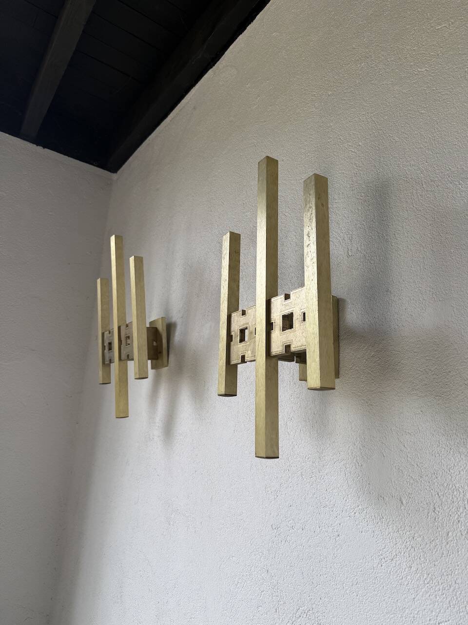 Pair of Regency brass wall lights in Italy