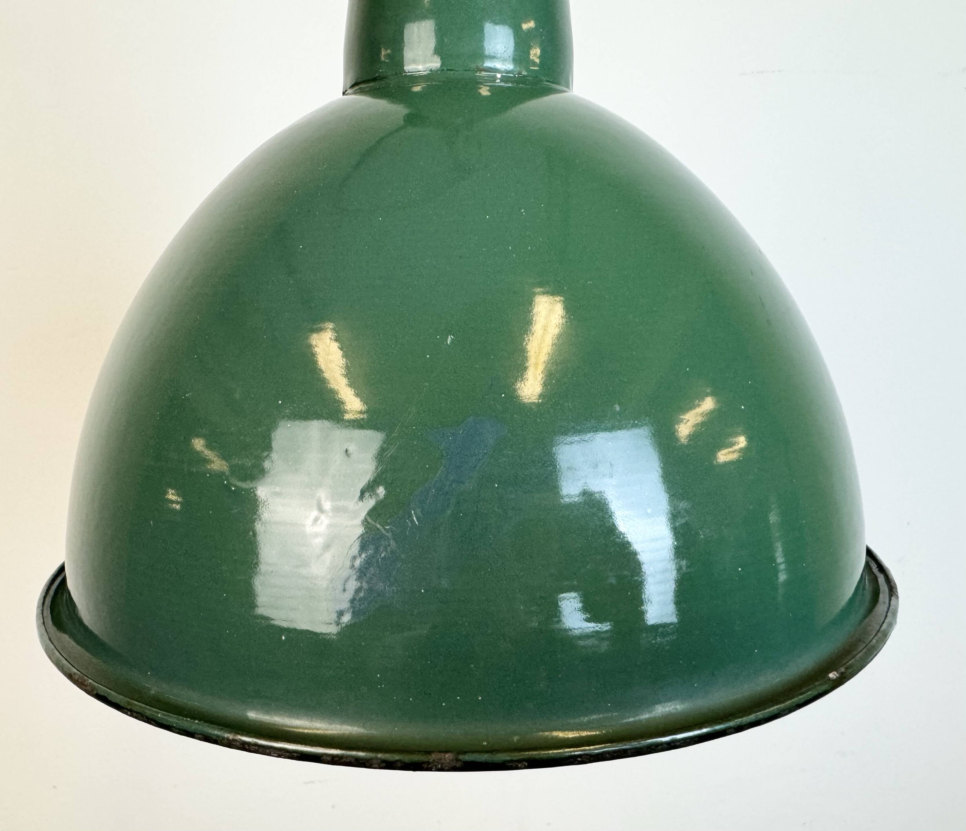 Industrial green enamel factory lamp with cast iron top, 1960s