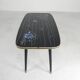 Vintage coffee table with glass top and angled legs