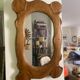 Polymorphic mirror in vintage wood