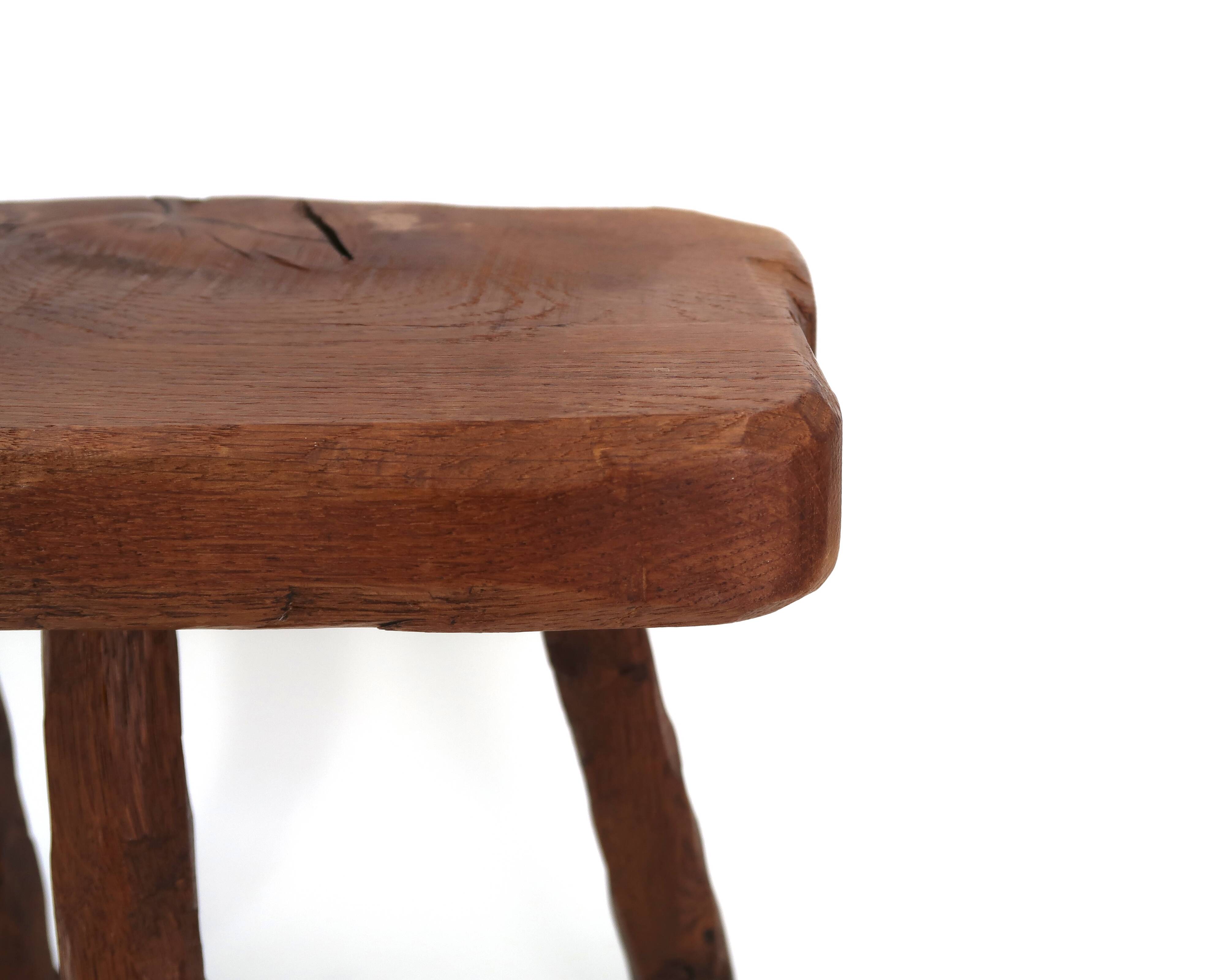 Brutalist tripod stool in wood, 1950s mountain folk art.
