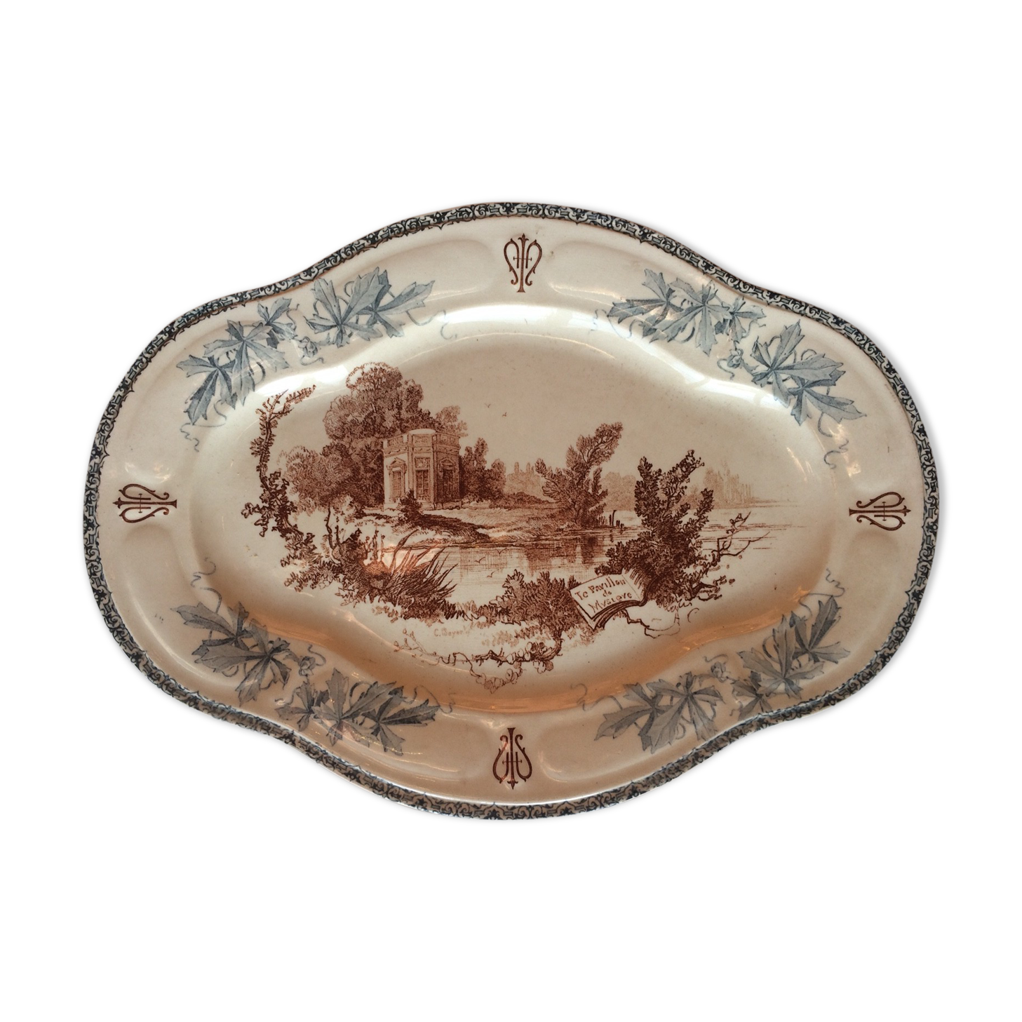 Ancient dish made of earthenware from the factory of Choisy the King