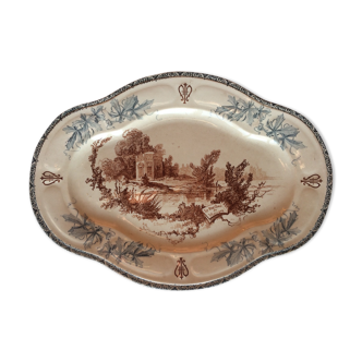 Ancient dish made of earthenware from the factory of Choisy the King