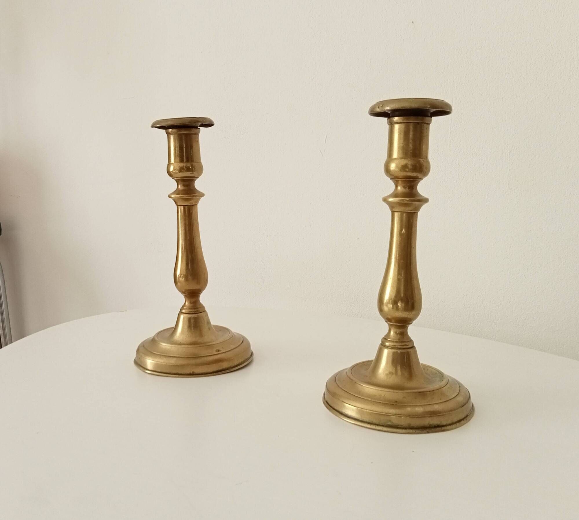Pair of old candlesticks in solid gilded brass