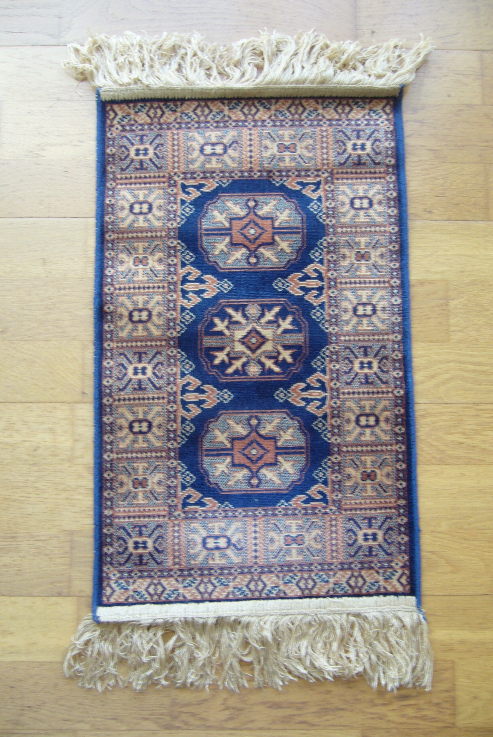 Three oriental rugs 35 x 70 cm