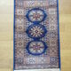 Three oriental rugs 35 x 70 cm