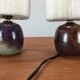 Pair of ceramic sandstone ball lamps and wool lampshades