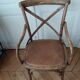 Curved wooden armchair