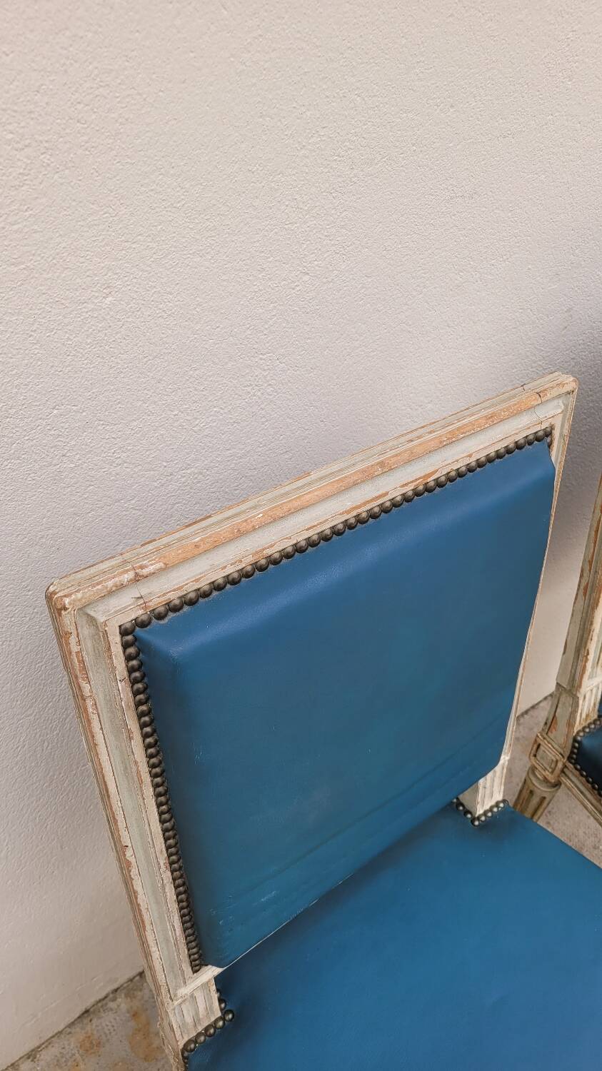 Pair of antique Louis XVI style chairs with patina