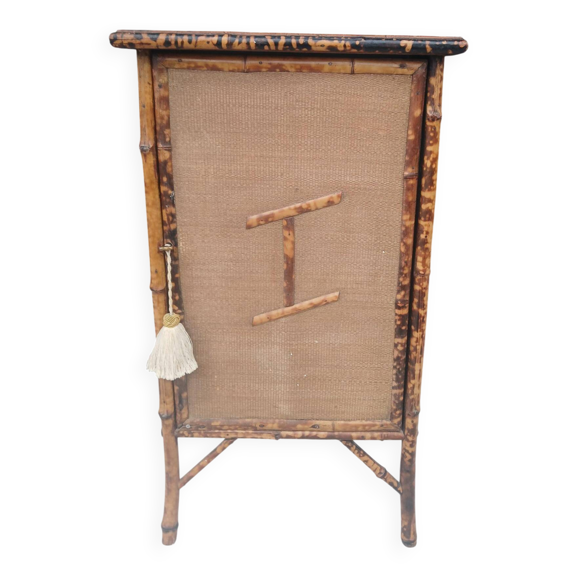 burnt bamboo wardrobe and grass cloth
