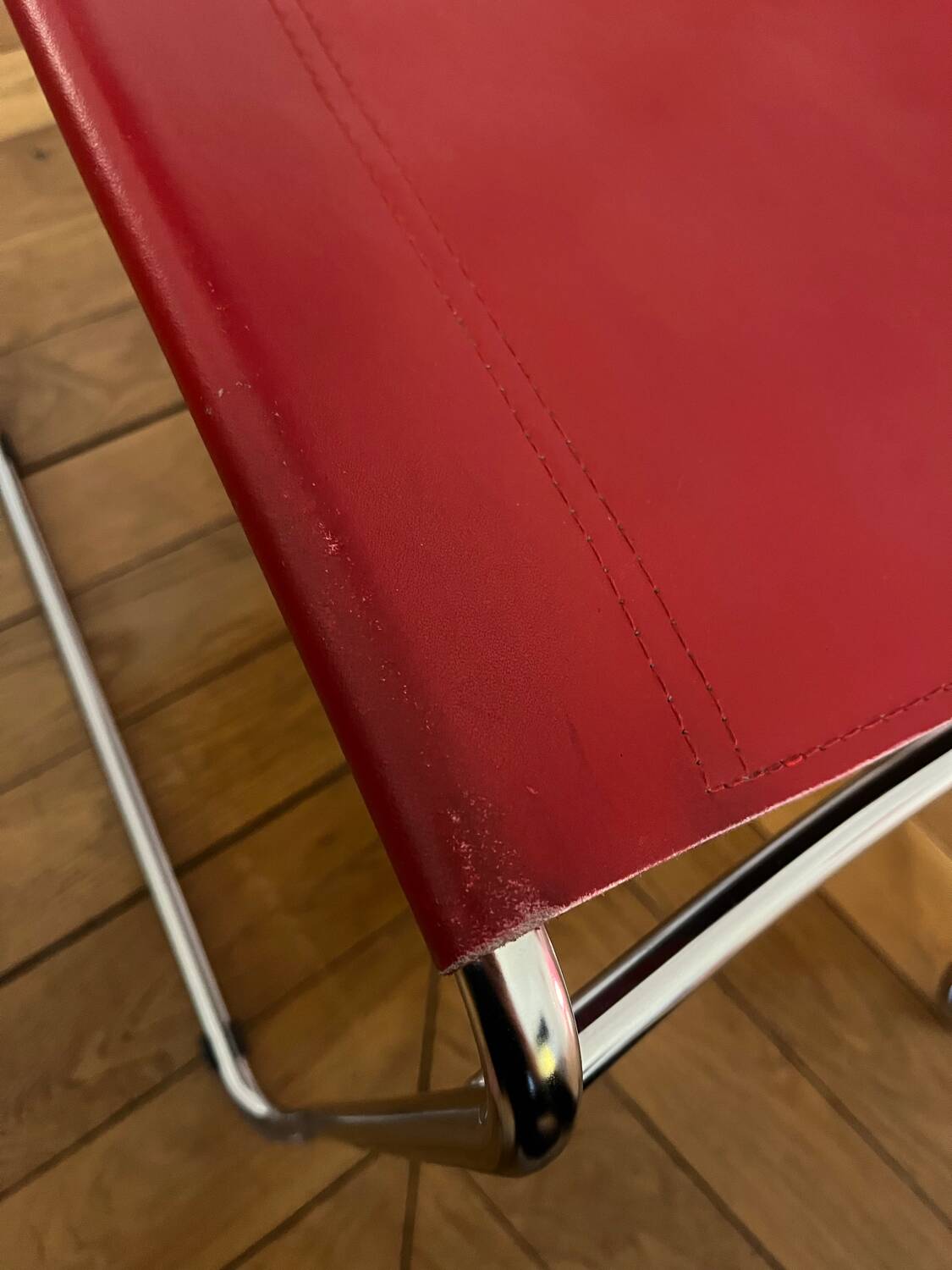 Set of 4 chairs in red leather and chrome tubular metal