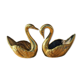 Golden brass swans duo