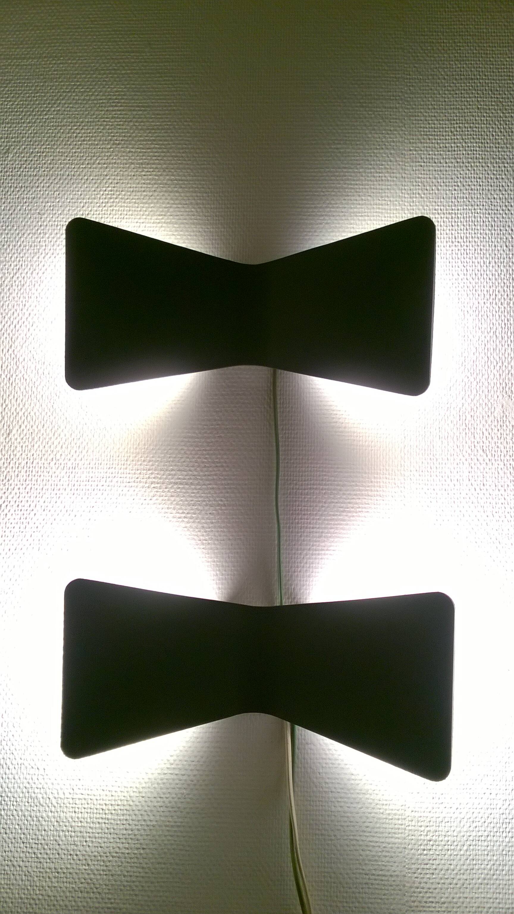 Fontana Arte 4310 Flex wall lights designed by Karim Rashid