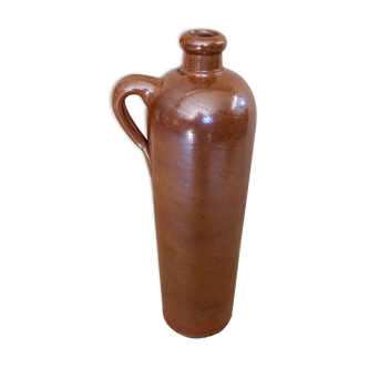 Bottle in sandstone