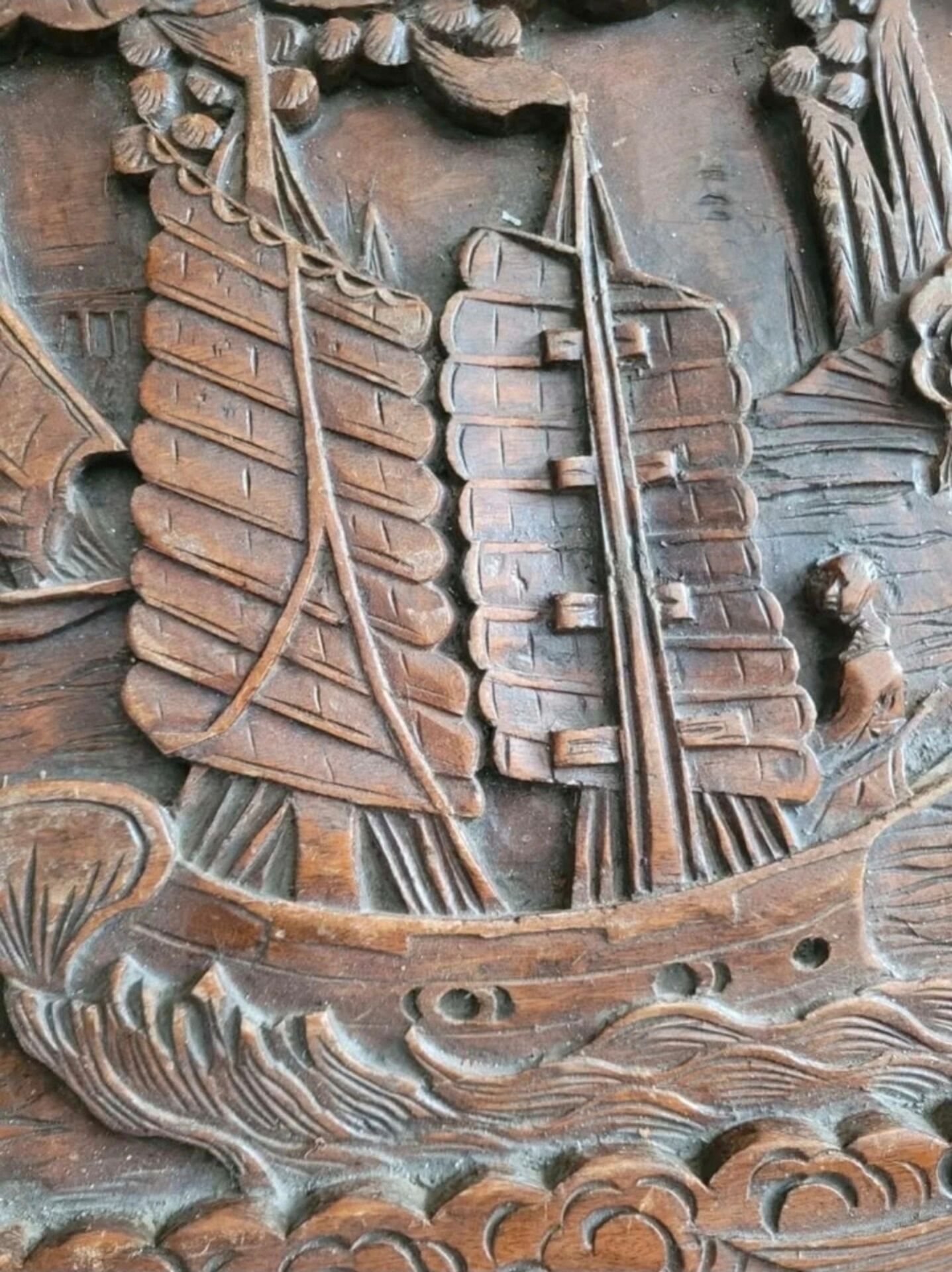 Carved chest in Asian camphor wood, chinoiserie boat decoration.