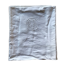 Antique sheets. Monogram in white embroidery.
