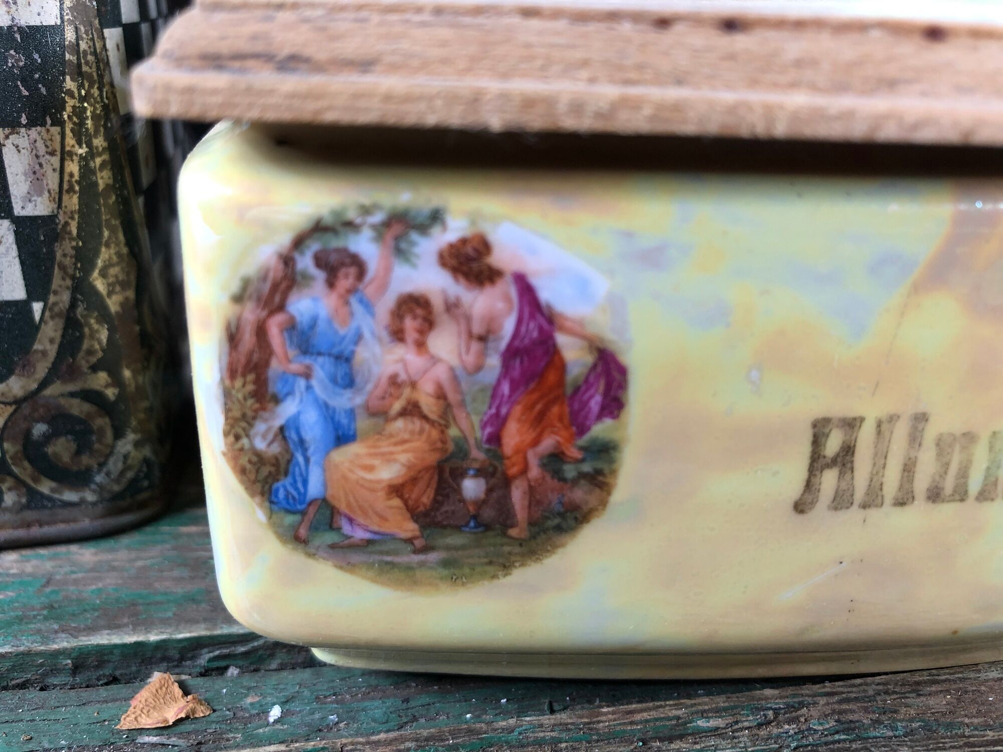 Matchbox or salt in enamelled yellow wall with decoration of women