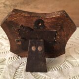 Photo frame in worked wood.