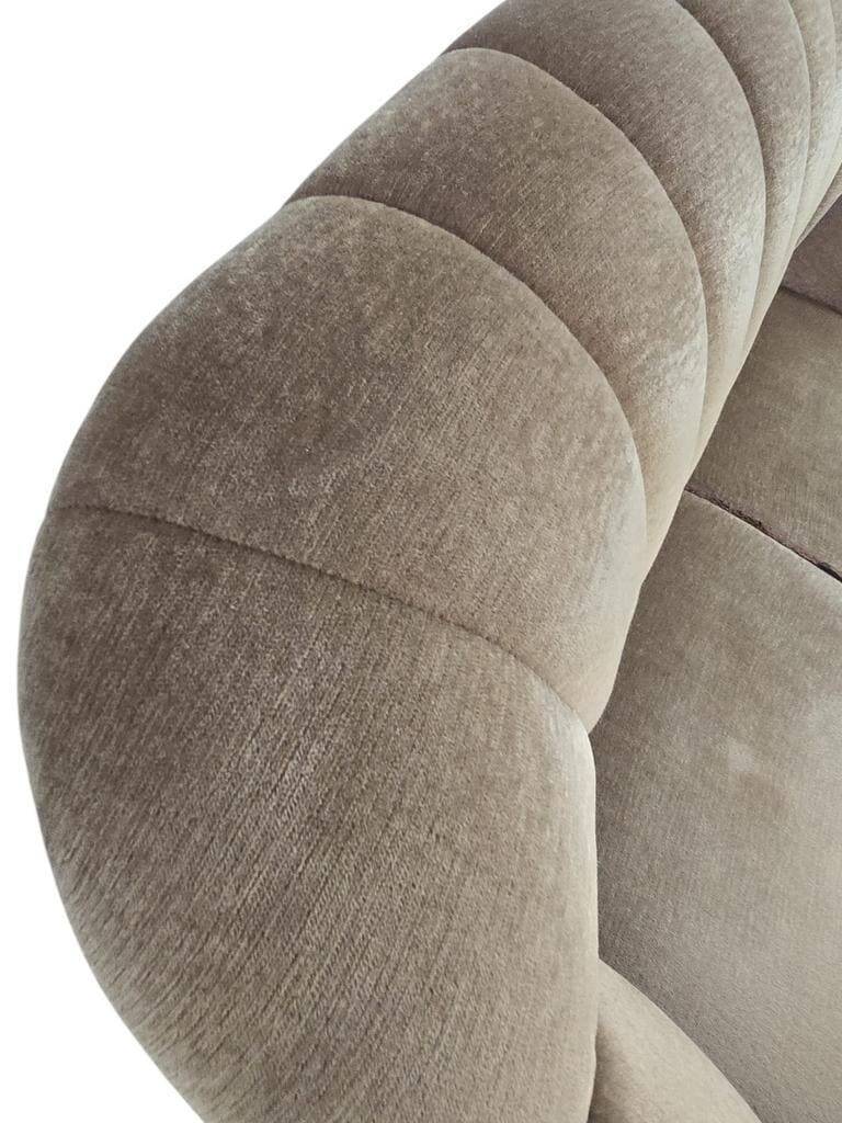 Vintage taupe two-seater canapé with fringes.
