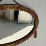 Small oval Art Deco mirror in brown and gold 33x54.