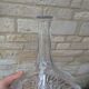 Antique cut crystal decanter with stopper.