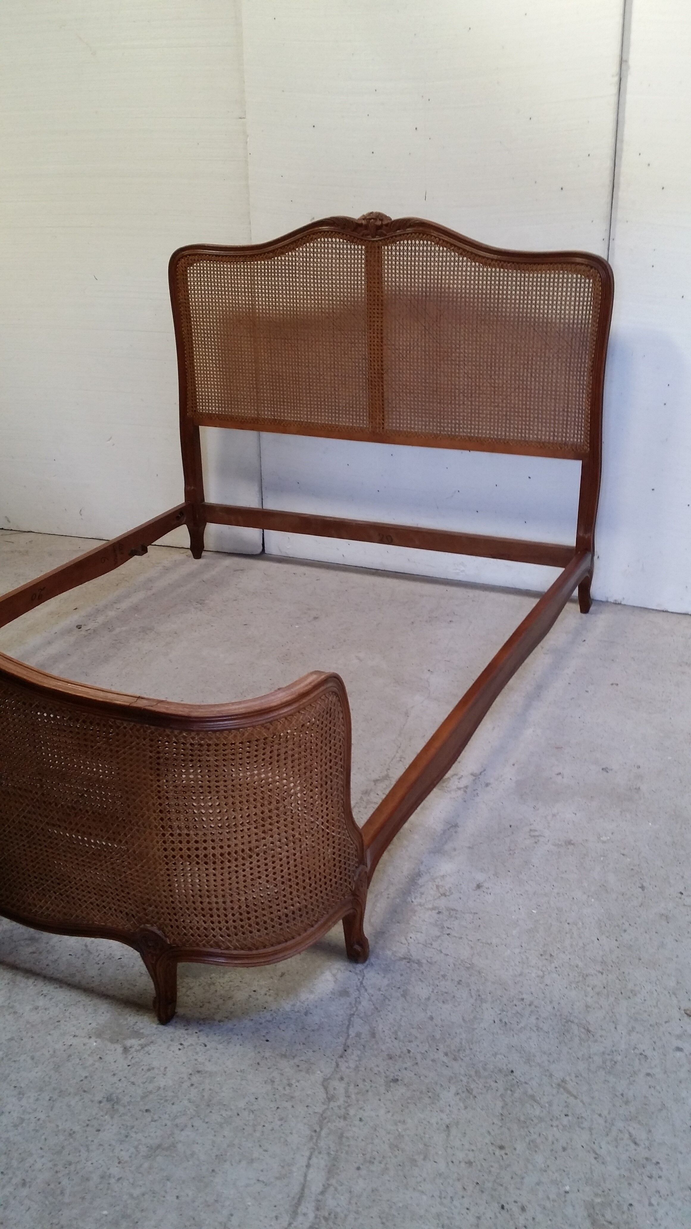 Wooden bed with canna bottom