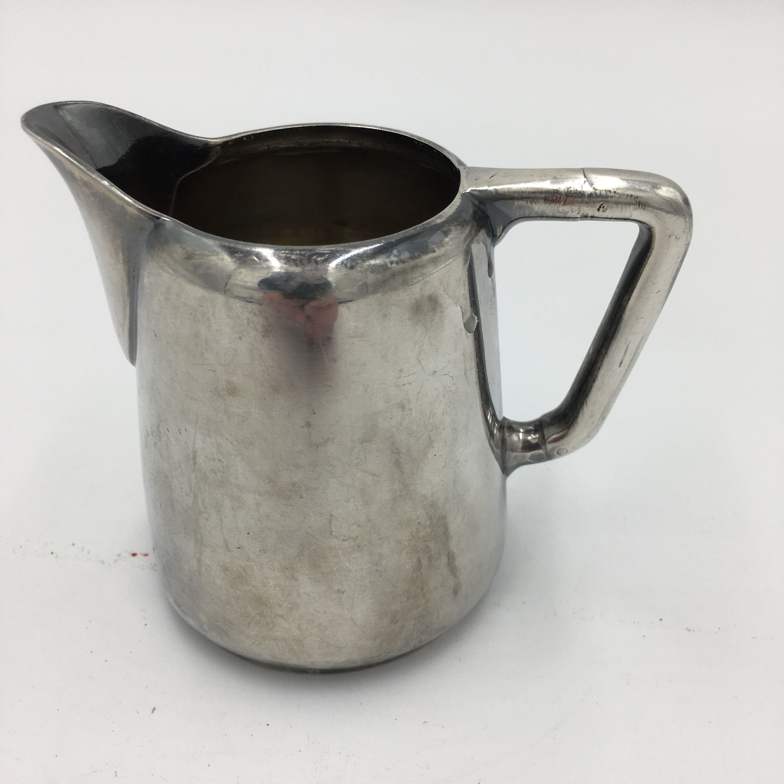 Silver milk pot