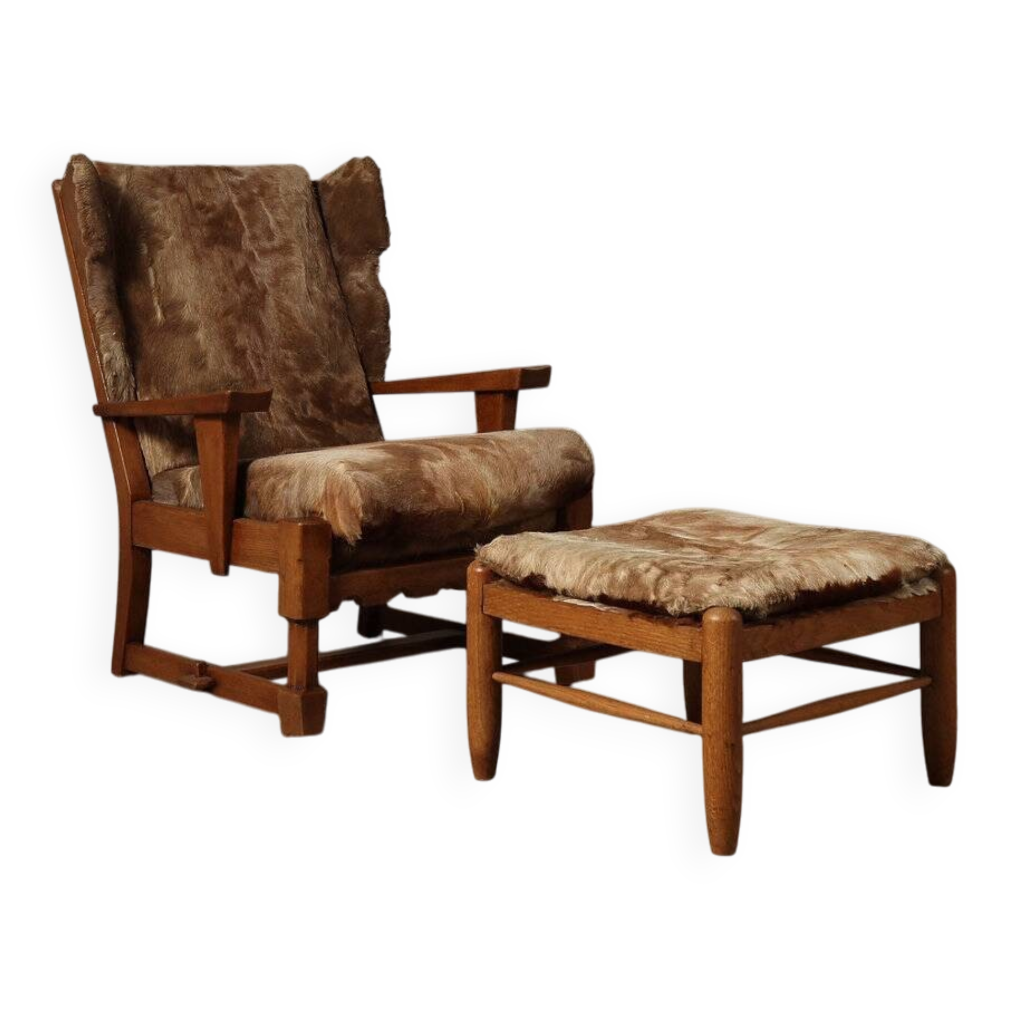 Brutalist oak lounge chair and ottoman in original goat hide, 1960s