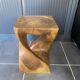 Stool no. 1 in solid raw walnut wood, carved from the mass, 1970.