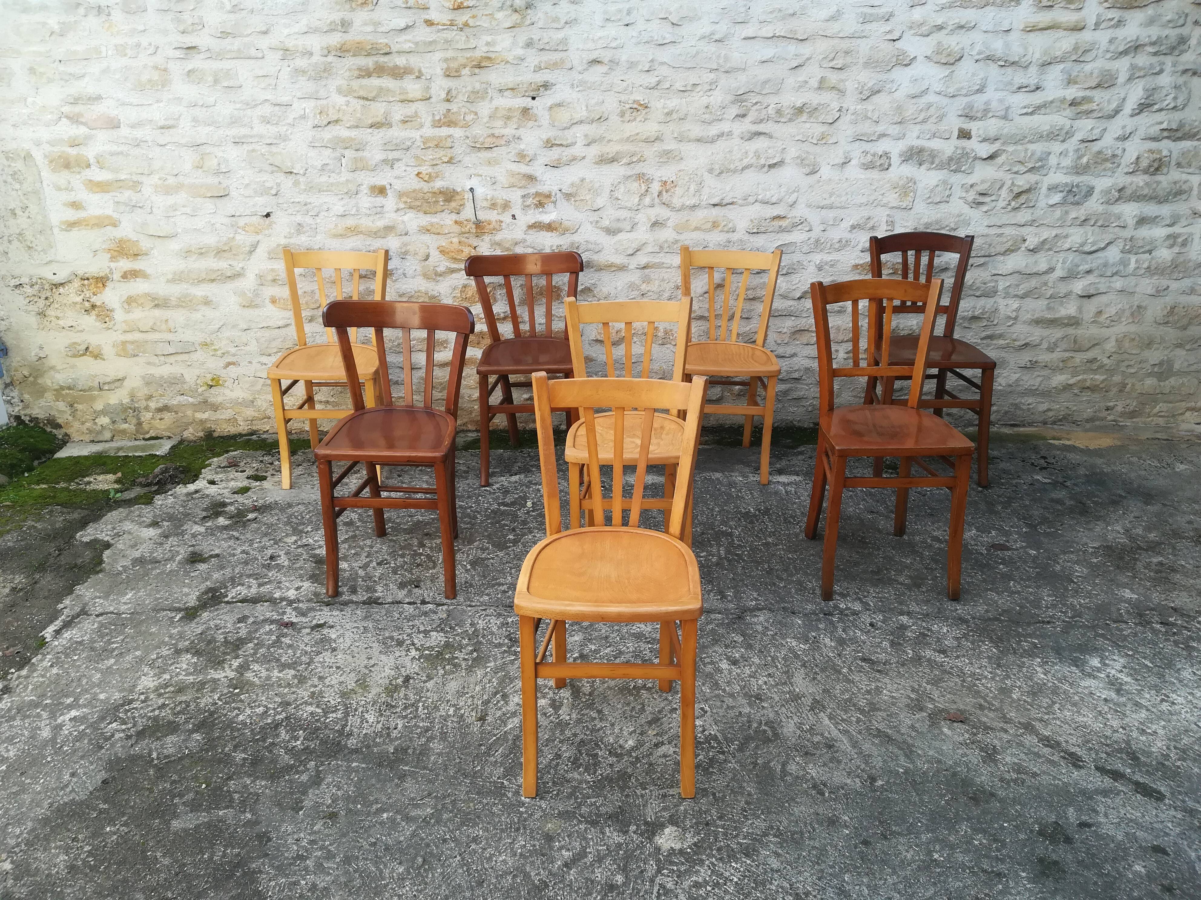 Set of 8 mismatched bistro chairs
