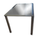 Dining table in chromed steel and smoked glass top, 1969