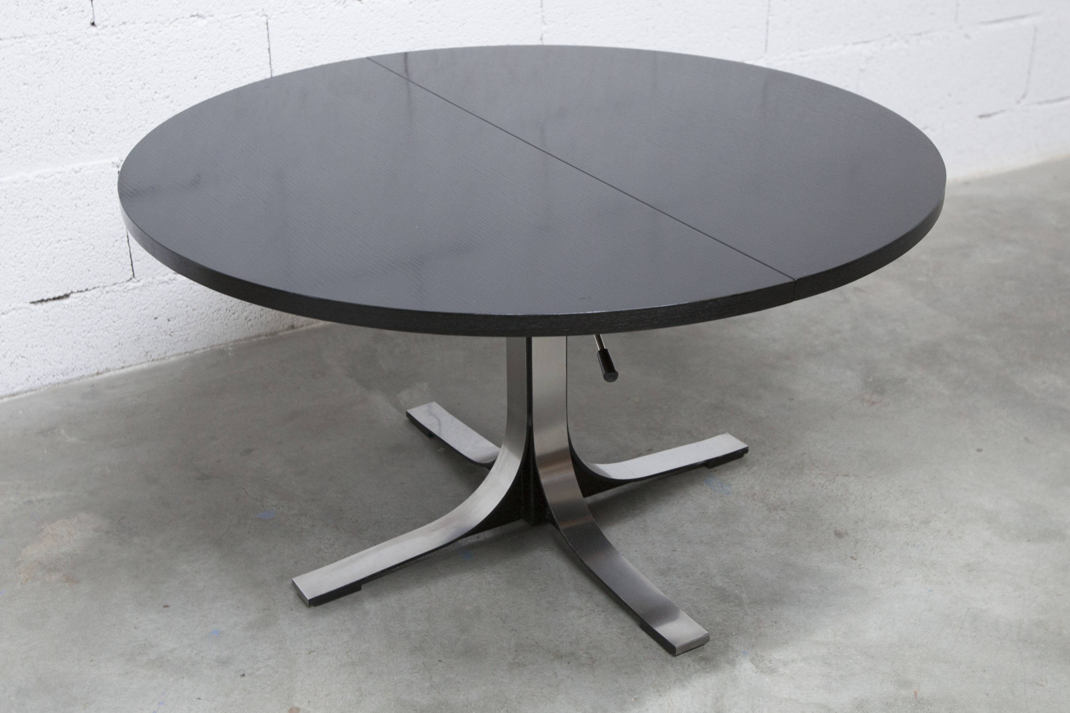 Round table rises and lowers Osvaldo Borsani black and chrome with extension