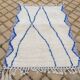 Small natural wool rug, 100 x 200 cm