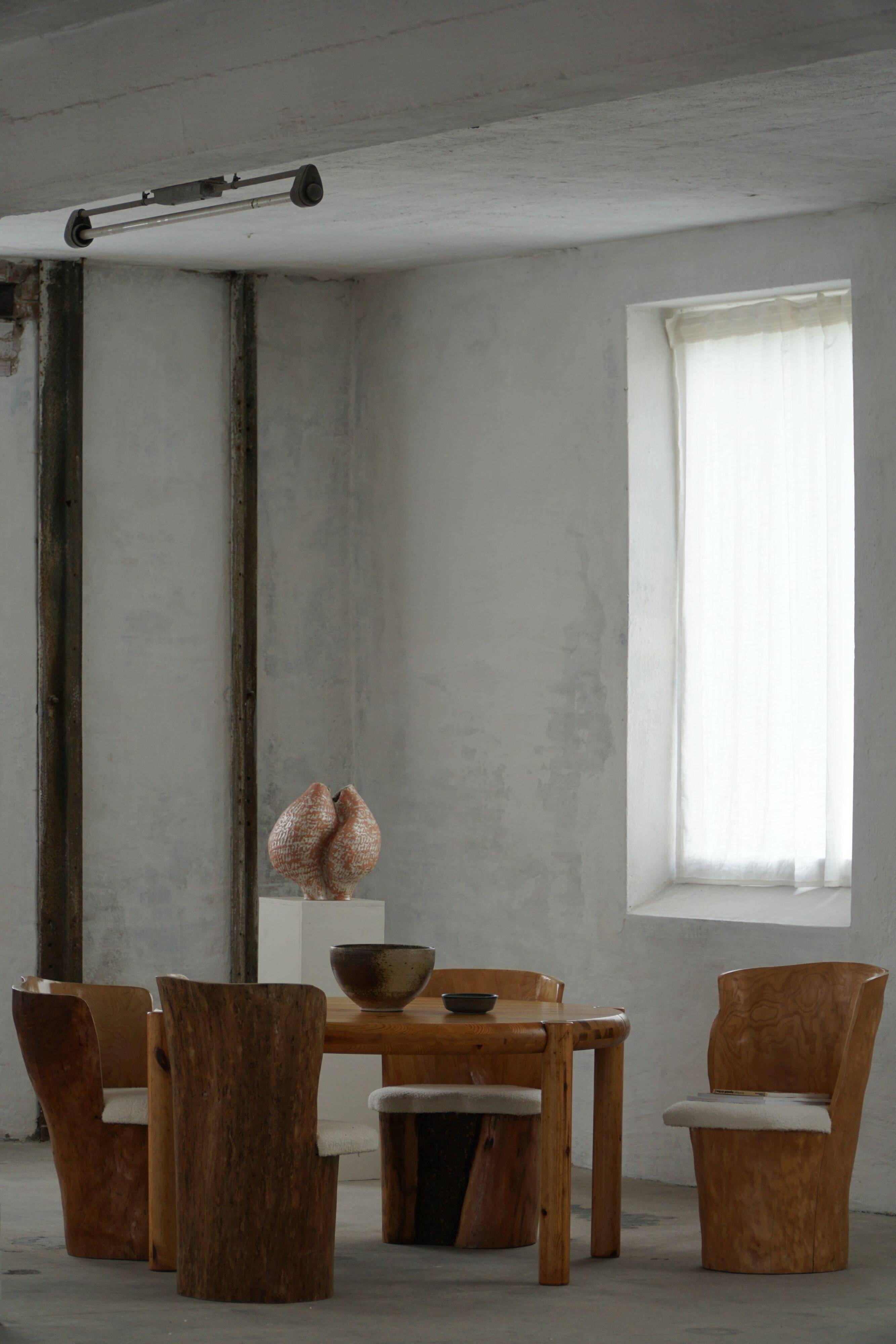 Swedish modernity, set of four stump chairs, solid Wood Wood with boucle seats, 1960s.