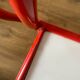 4 red metal chairs by Mallet-Stevens