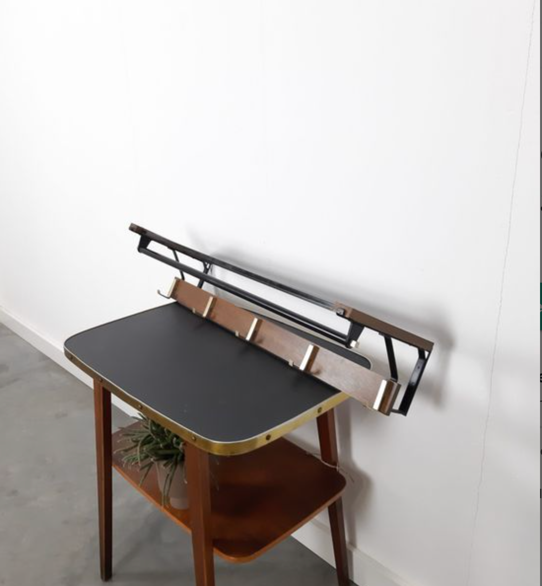 Vintage wooden wall coat rack with hooks and brass shelf